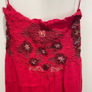 Never worn Free People strapless jumpsuit w/ embroidered top.
